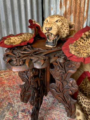 A Victorian taxidermy leopard rug