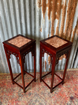 A pair of Chinese marble pedestal stands
