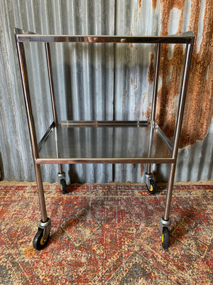 A stainless steel two-tier medical trolley ~ 2
