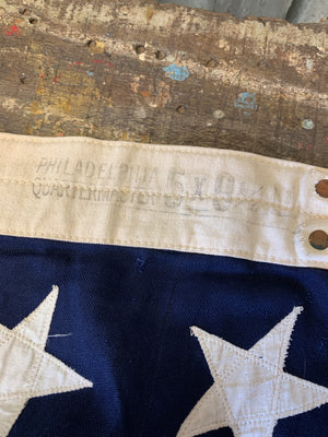 A very large US flag with Philadelphia Quartermaster maker's mark