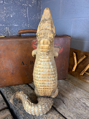 A large anthropomorphic taxidermy crocodile "butler"