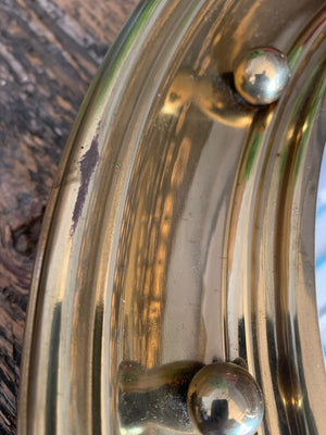 A large Regency style brass convex ball mirror