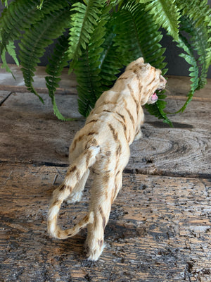 A Victorian taxidermy miniature papier-mâché tiger figure