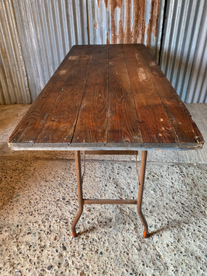 A wooden plank top folding trestle table - Table 2