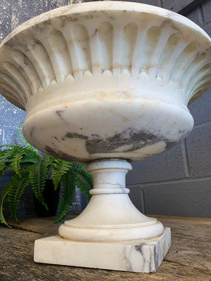 A solid marble campana urn