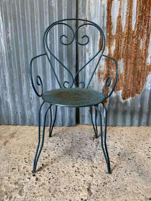 A set of four French blue wire work garden chairs