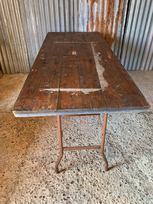 A wooden plank top folding trestle table - Table 3