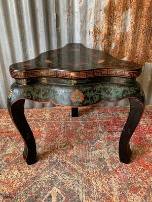 An ebonised and decorated Chinese table by Jinlong