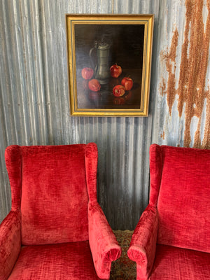 A large still life oil painting of apples and a tankard