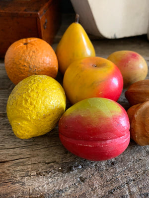 A set of eight hand-painted alabaster fruit and nuts