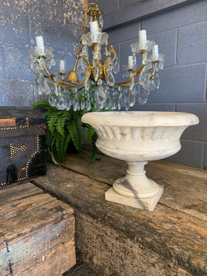 A solid marble campana urn