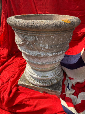 A very large composition stone urn