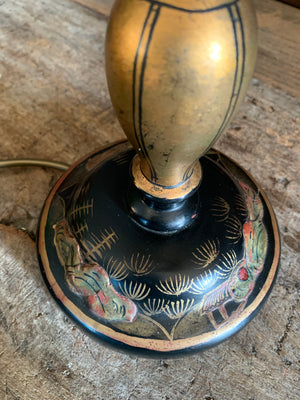 A tall black Chinoiserie table lamp