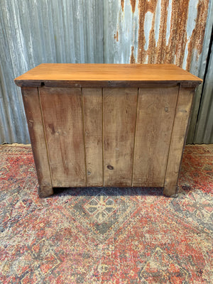 A limed tramline chest of drawers