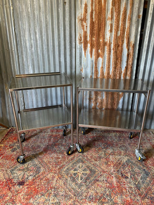 A stainless steel two-tier medical trolley ~ 1