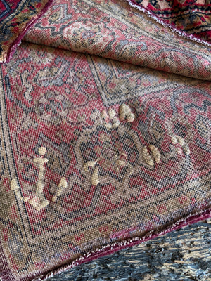 A large red ground velvet throw or 'Dutch tablecloth'