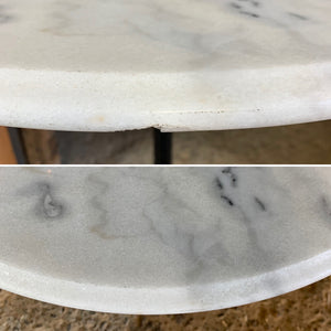 A black cast iron bistro table with marble top 2/3