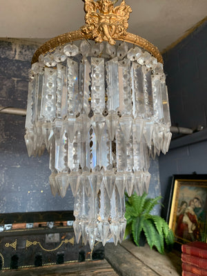 A gilt three tier crystal lustre chandelier - medium