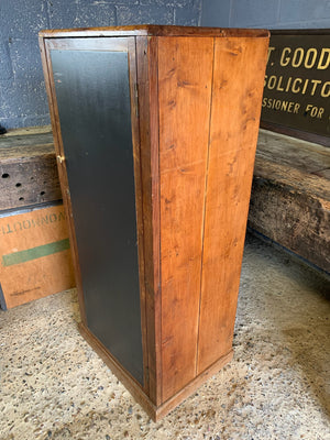 A school cupboard with interior shelving