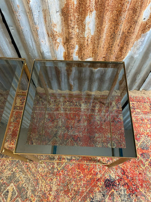 A pair of brass and glass Hollywood Regency side tables