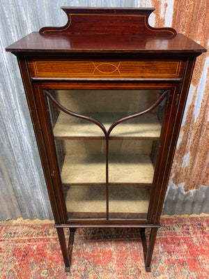 An Edwardian inlaid glass display cabinet