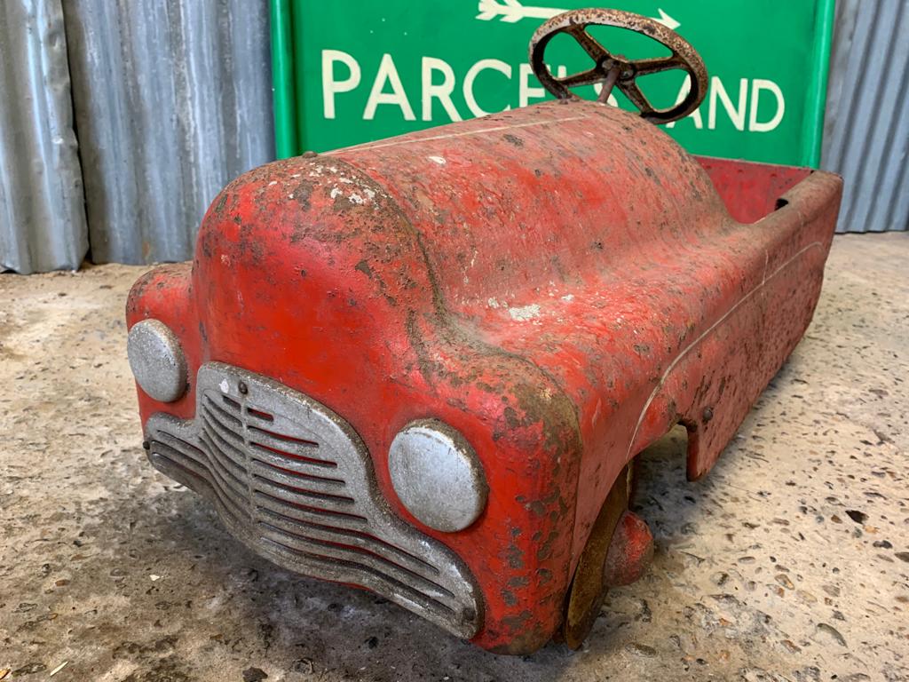 A Tri-ang Thunderbolt child's pedal car