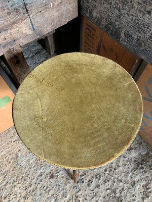 A wooden bobbin gypsy table with mustard velvet top