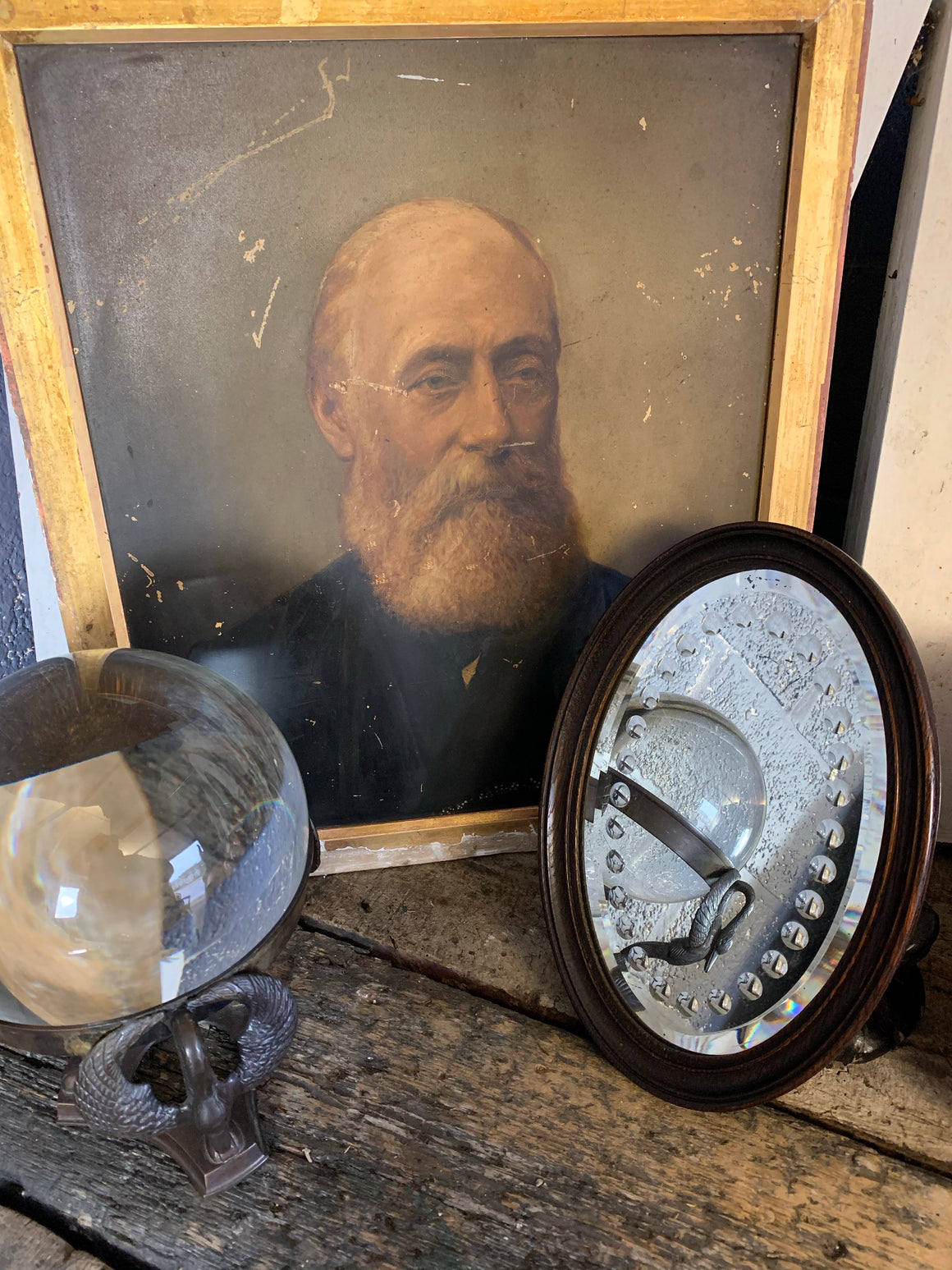 A 19th Century sorcerer’s mirror in an oval mahogany frame