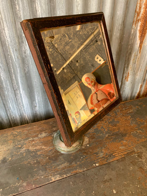 An adjustable gentleman's shaving mirror