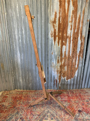 A floor standing wooden artist's easel by Winsor and Newton