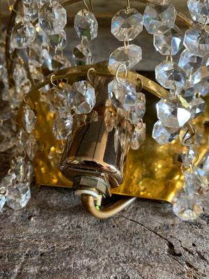 A pair of brass Hollywood Regency style wall sconces