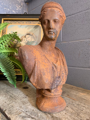 A cast iron bust of the Diana of Versailles (Artemis), goddess of the hunt