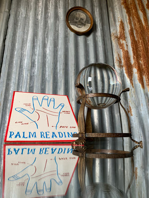 A fairground 'Palm Reading' sign