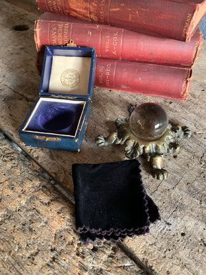A Victorian Two Worlds Ltd fortune teller's cased crystal ball