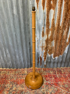 A faux bamboo floor lamp