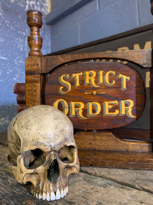 A wooden Liberty Hall/Strict Order Masonic sign