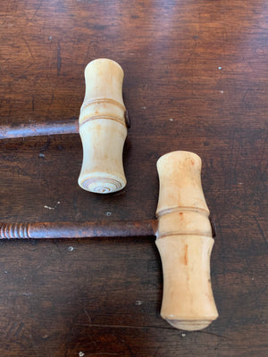 A pair of Victorian bone handle boot pulls