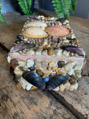A medium seashell encrusted trinket box