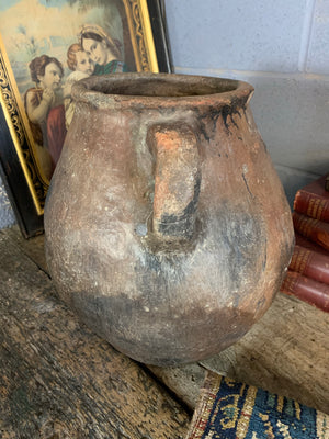 A large terracotta urn with double lug handles ~1