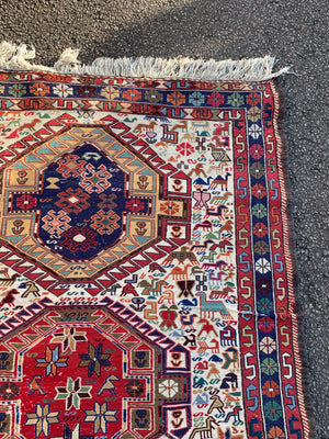 A Persian Caucasian flat weave rectangular rug