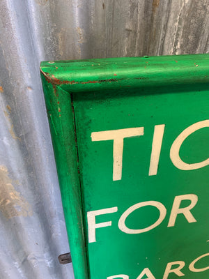 A large hand painted railway ticket office sign