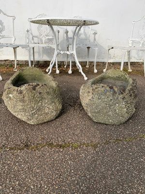A pair of cast stone faux bois trough planters