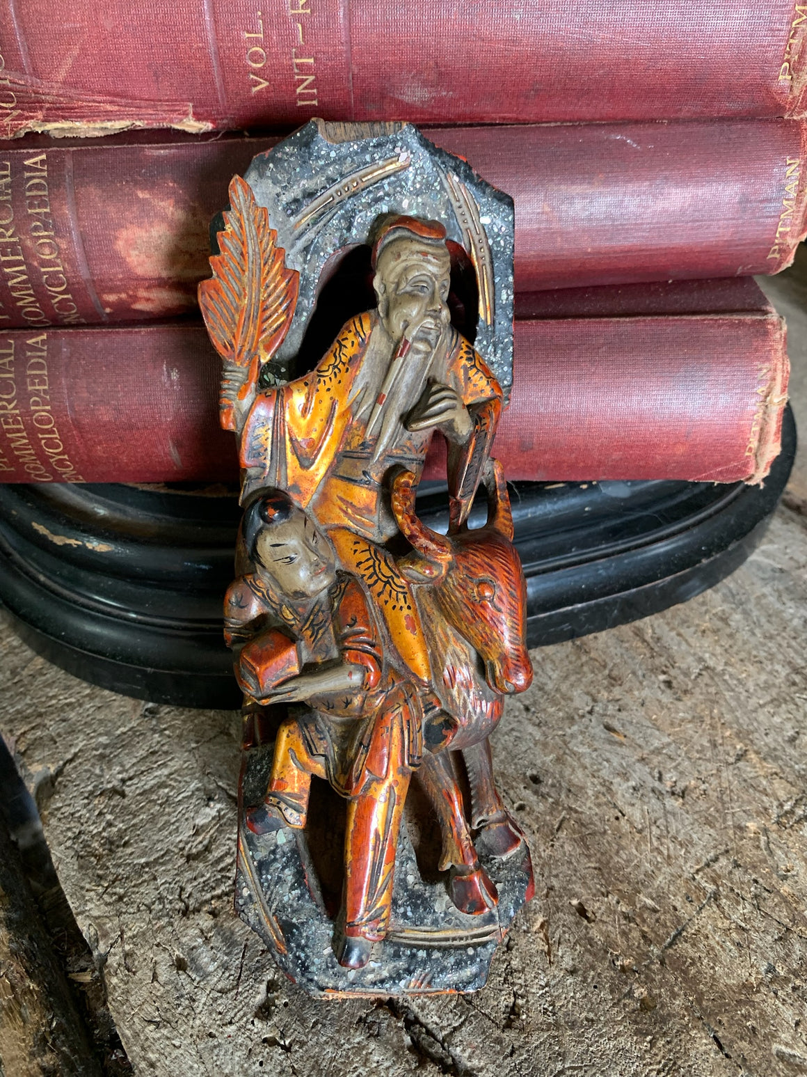 A 19th Century Chinese carving with polychrome detailing