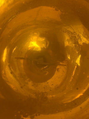 A very large golden mercury glass witches ball