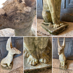 A large weathered cast stone Anubis dog statue (85cm)