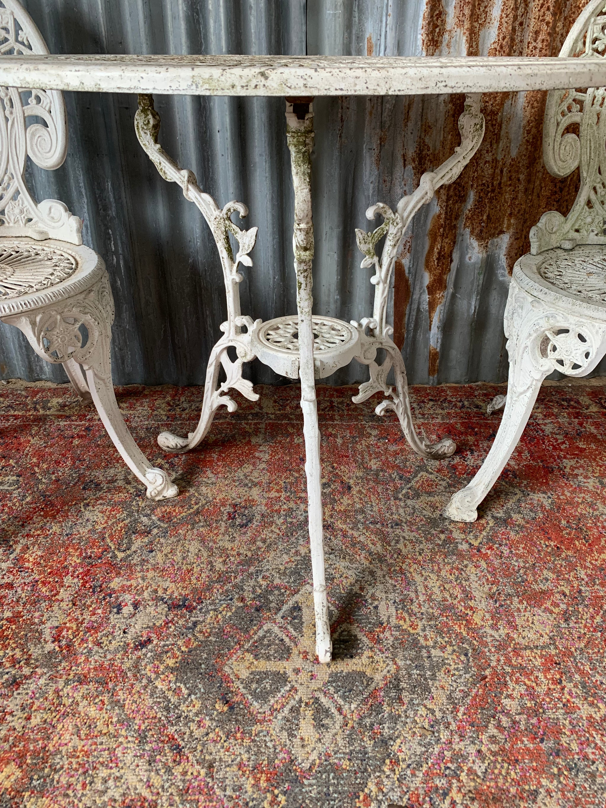 A white Victorian style table and two chairs garden set Belle