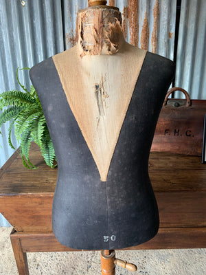A French male mannequin on turned wooden stand