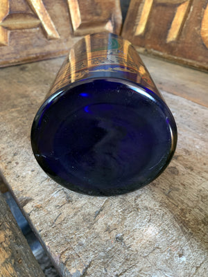 A blue glass myrrh apothecary jar by the Royal Pharmaceutical Society