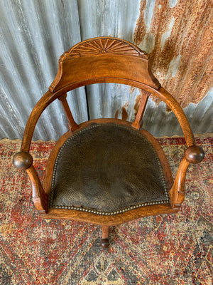 A Victorian ball arm desk chair