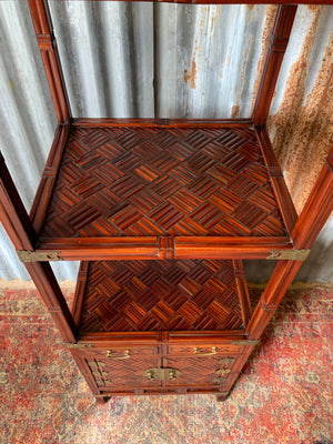 A tall bamboo parquet Chinese etagere